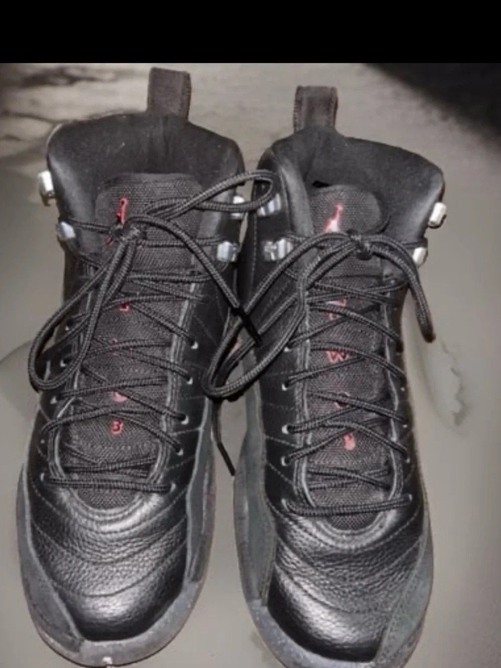 Air Jordan 12 Retro Utility 'Grind' sneaker in black tumbled leather,Youth 7Y